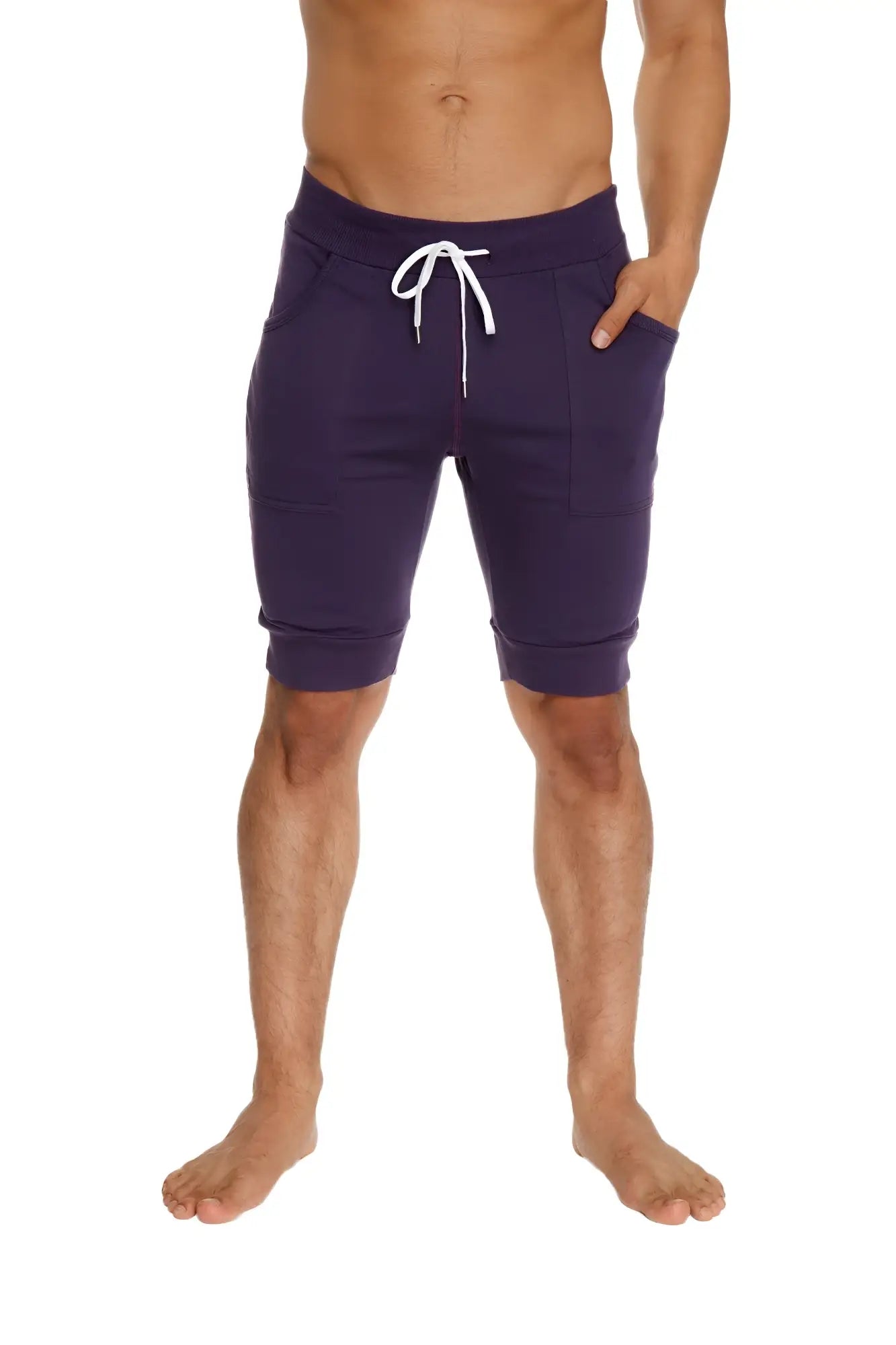 Cuffed yoga short in navy blue with white drawstring and side pockets designed for athletic wear