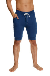 Navy blue cuffed yoga shorts with white drawstring and side pockets designed for athletic wear
