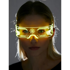 Cyberpunk light up glasses featuring a glowing yellow led visor with futuristic circuit and hand gesture designs