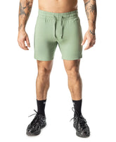 Mint green delta rugby short with elastic waistband and drawstring designed for athletic use