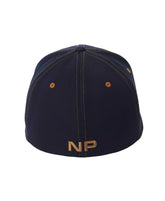 Dark blue denim baseball cap with gold stitching and embroidered np logo shown from the back side in denim snout 2-tone cap