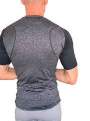 A men’s designer raglan crew-neck tee with heathered charcoal body, black sleeves, and subtle seam detailing for performance fit