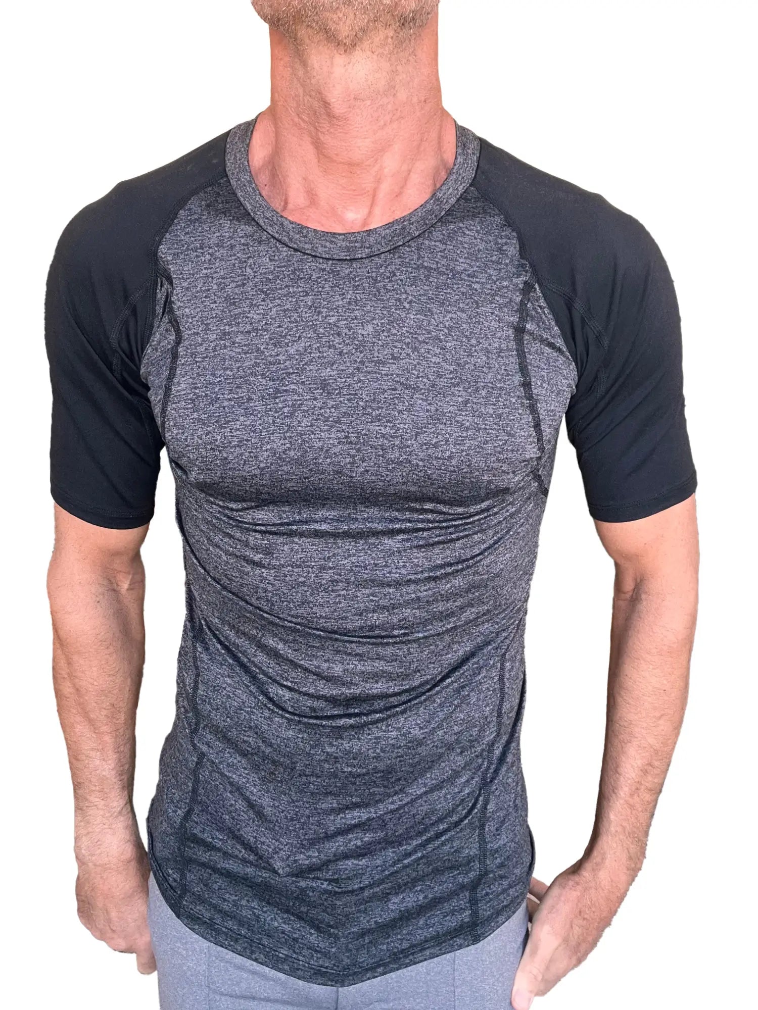 Men’s designer raglan crew-neck tee with heathered charcoal torso and solid black sleeves with subtle seam detailing