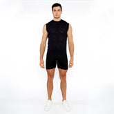 Black sleeveless knit vest with intricate diamond pointelle geometric pattern perfect for layering and style