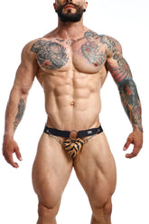Black and tan tiger-print thong jockstrap with chain belt detail from dngeon showing back side view