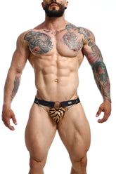 Black and tan tiger-print thong jockstrap with chain belt detail from dngeon showing back side view