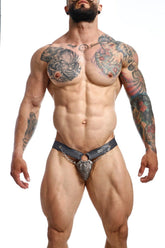 Black and silver metallic lace-trimmed thong with chain detail from dngeon chain jockstrap camo collection