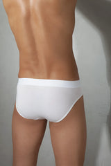 White doreanse solid brief underwear size s with smooth form-fitting design and subtle logo on waistband