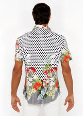 A vibrant short-sleeved dots abstract s s woven modal border shirt with black white polka dots and colorful floral prints