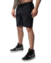 Black drill short athletic shorts with drawstring waistband and subtle logo on the lower left leg