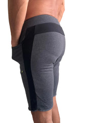 Eco-track short charcoal w black athletic shorts with ribbed waistband side panels and green logo on thigh
