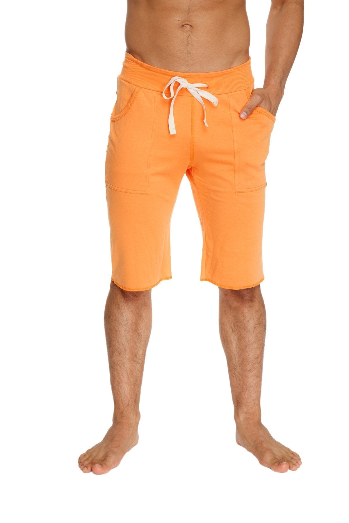 Bright orange eco track cotton shorts with white drawstrings and side pockets for casual outdoor use