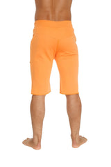 Orange eco-track athletic shorts with relaxed fit and side pockets made from eco-friendly material