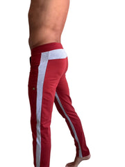 Eco-track and yoga sweat pant in cinnabar red with a textured gray side stripe and white waistband panel