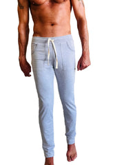 Light gray heathered eco-track and yoga sweat pant with white drawstring and side pockets for comfort and movement