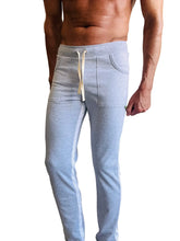 Eco-track and yoga sweat pant in heather grey with white side stripes and cream drawstring made from soft fabric
