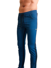Eco-track and yoga sweat pant in royal blue with black side stripes and a drawstring waistband for athletic use