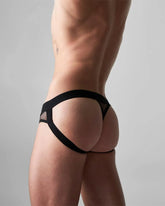 Black mesh edge net jock thong with solid black waistband and leg straps showing front side details