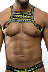 Neon green and black patterned electro holographic harness with xse*ricks branding designed for a bold look