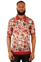 A man wearing an Entwine Form polo shirt with vibrant red and brown floral pattern on light beige fabric with maroon trim