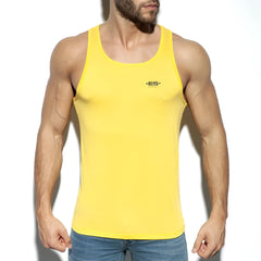 Bright yellow es basic tank sleeveless tank top with small black logo on chest for casual wear