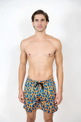 Men’s feather print swim shorts with vibrant blue and orange leaf pattern and black drawstring waistband