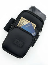 Black fk sport 3 pocket neoprene arm pouch with zippered compartments holding cash and phone