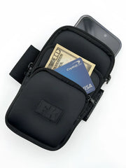 Black fk sport 3 pocket neoprene arm pouch with zippered compartments holding cash and phone