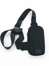 Black nylon FK sport crossbody bag with adjustable strap and zipper closure for hands-free carrying