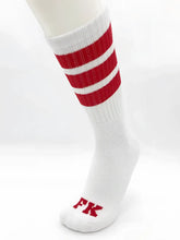 Fk sport white tube sock with three bold red stripes near the top and matching fk logo embroidered on the toe