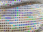 Flat sequin hooded crop top in shimmering silver fabric with iridescent multicolored sequins in a grid pattern