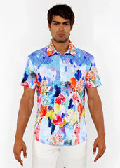 Vibrant floral abstract short-sleeved woven modal shirt with bold blue red orange and yellow pattern