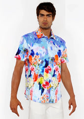 Vibrant short-sleeved woven modal button-up shirt with bold abstract floral pattern in blue pink orange and yellow