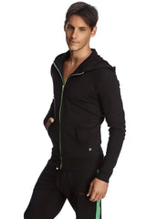 Form-fit crossover yoga track performance hoodie in black with green zipper trim and side stripe on pants