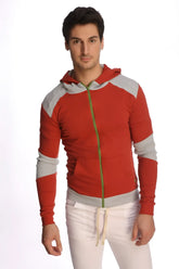 Form-fit crossover yoga track performance hoodie in cinnabar grey with red and gray zip-up design and green zipper