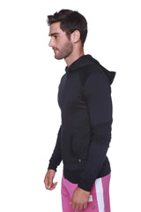 Black form-fit crossover yoga track performance zip-up hoodie with subtle textured pattern and pink athletic pants
