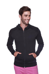 Form-fit crossover yoga track performance hoodie in solid black with black zipper paired with contrasting pink pants