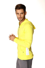 Form-fit crossover yoga track performance hoodie in tropic yellow with white side panels and matching hood zip up style