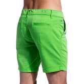 Bright green frog chino shorts with subtle textured weave and branded logo on waistband and back pocket shown from back