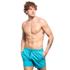 Bright turquoise frog swim trunk with drawstring waistband and subtle side trim perfect for swimming and beachwear