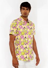 Fruits print stretch knit shirt with short sleeves featuring a vibrant pattern of sliced limes lemons and strawberries