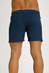 Dark blue denim fusion yoga shorts with relaxed fit and frayed hem ideal for casual wear