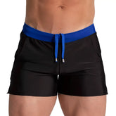 Black swim trunks with bold blue elastic waistband and matching drawstring from gigo alfa beachwear collection