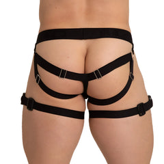 Black elastic harness jockstrap with silver metal buckles and adjustable straps by gigo amazonia shown from the back