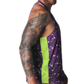 Aubergine-print tank top in purple with lime green mesh side panels and a racerback style.
