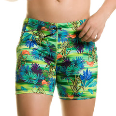 Vibrant tropical print swim trunks in neon green blue and purple with orange accents by gigo banana beachwear