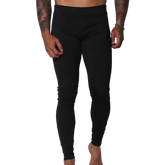 Form-fitting black Lycra leggings featuring a high-rise elastic waistband and a sleek, minimalist design.