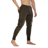 Olive green gigo cargo sportpants with multiple pockets and elastic cuffs ideal for casual wear