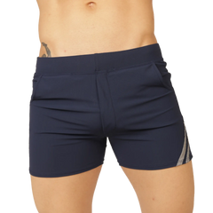 Navy blue gigo club blue short swim trunks with subtle gray and white striped side panel for casual swimming