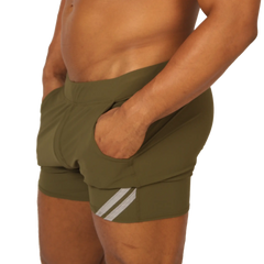 Olive green gigo club athletic shorts with white diagonal side stripes designed for active wear